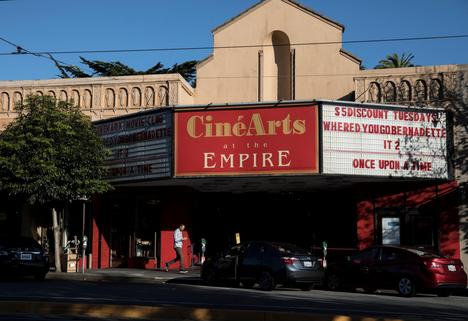 CinéArts at the Empire theater with a marquee promoting $5 discount Tuesdays and movies like "Where'd You Go Bernadette," "IT 2," and "Once Upon a Time."