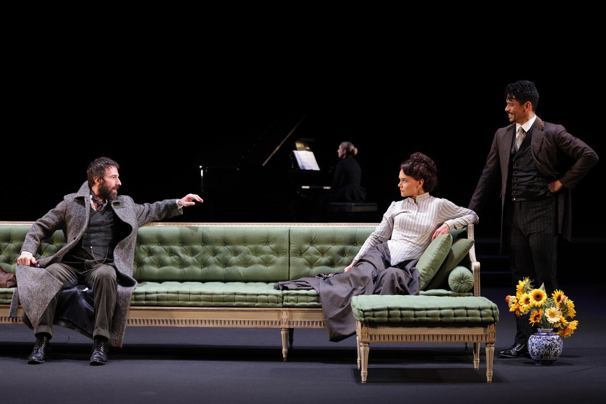 Alexander Hurt as Ejlert Lovborg, Katie Holmes as Hedda Gabler and Charlie Barnett as George Tesman in Hedda Gabler, 2026.