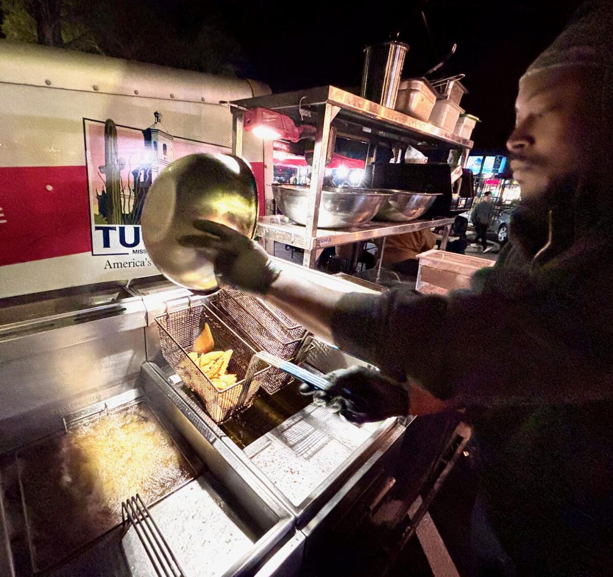 Fish goes into the deep fryer at Hot Grease, a Southern food pop-up in Santa Ana.