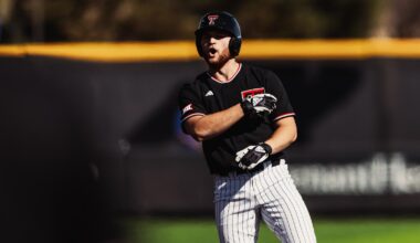 Texas Tech OF Jesse Rusinek wearing the Red Raiders red uniforms is greeted by teammates Linkin Garcia (4) and Matt Quintanar (26) after launching his first home run of his career on Saturday afternoon
