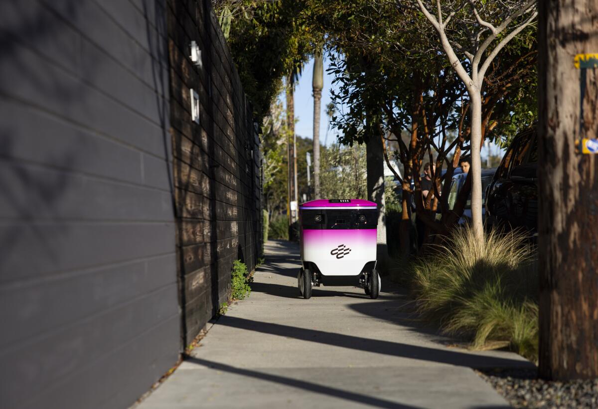 The new Coco 2 (Next-Gen) drives along the sidewalk at the Coco Robotics headquarters in Venice.