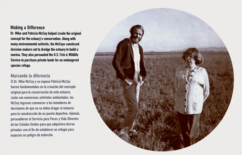A sign shows coastal conservationists Mike and Patricia McCoy as young adults "Making a Difference" at the estuary.