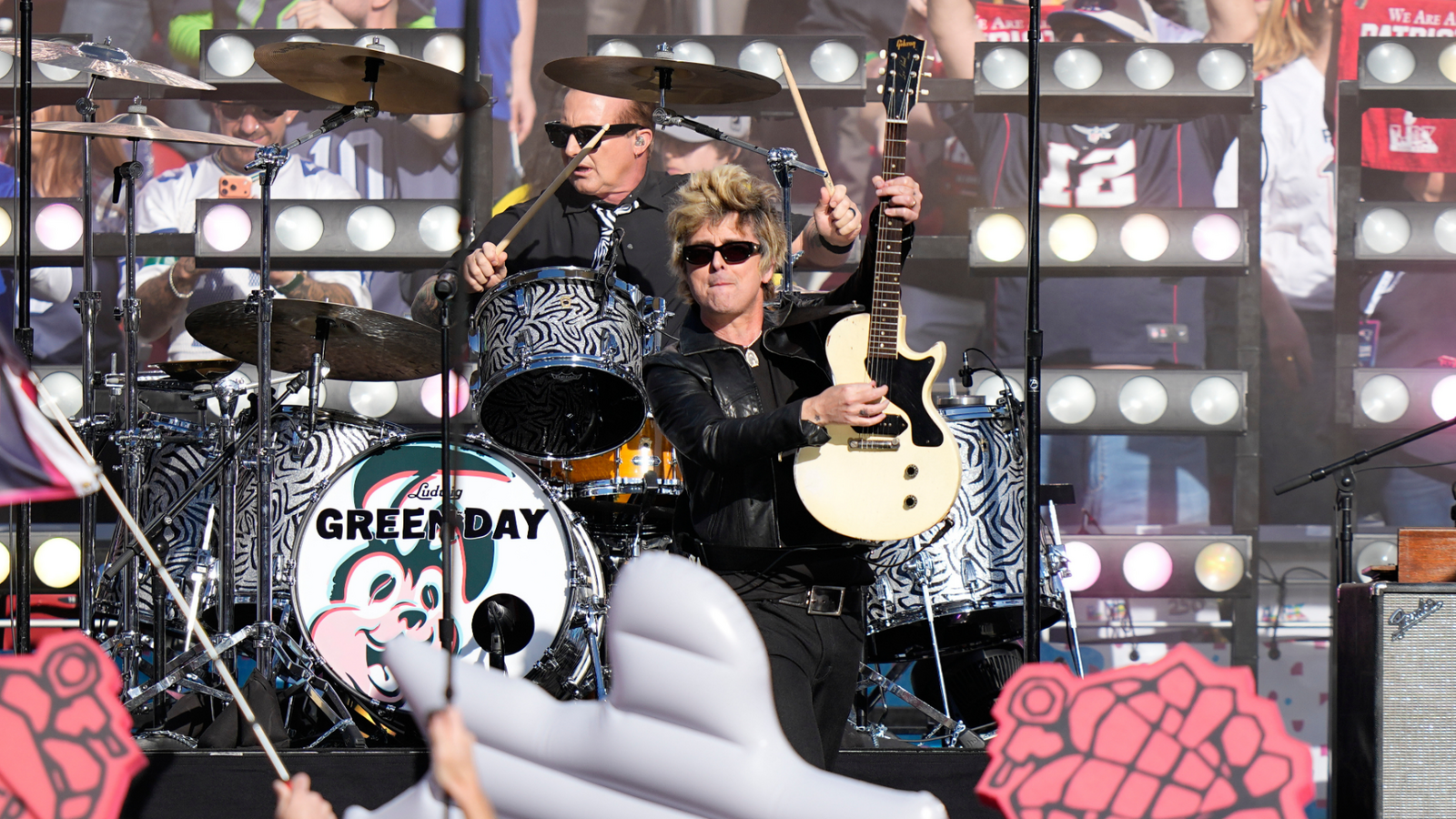 Green Day kicks off the big game with energetic performance