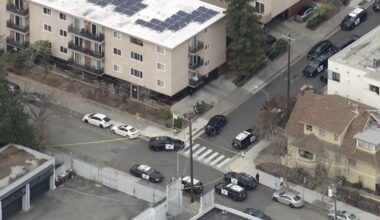 Oakland neighborhood evacuated after person possibly armed with gun barricades themselves inside residence, police say