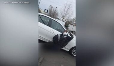 Man spotted hanging onto moving cars in Sacramento