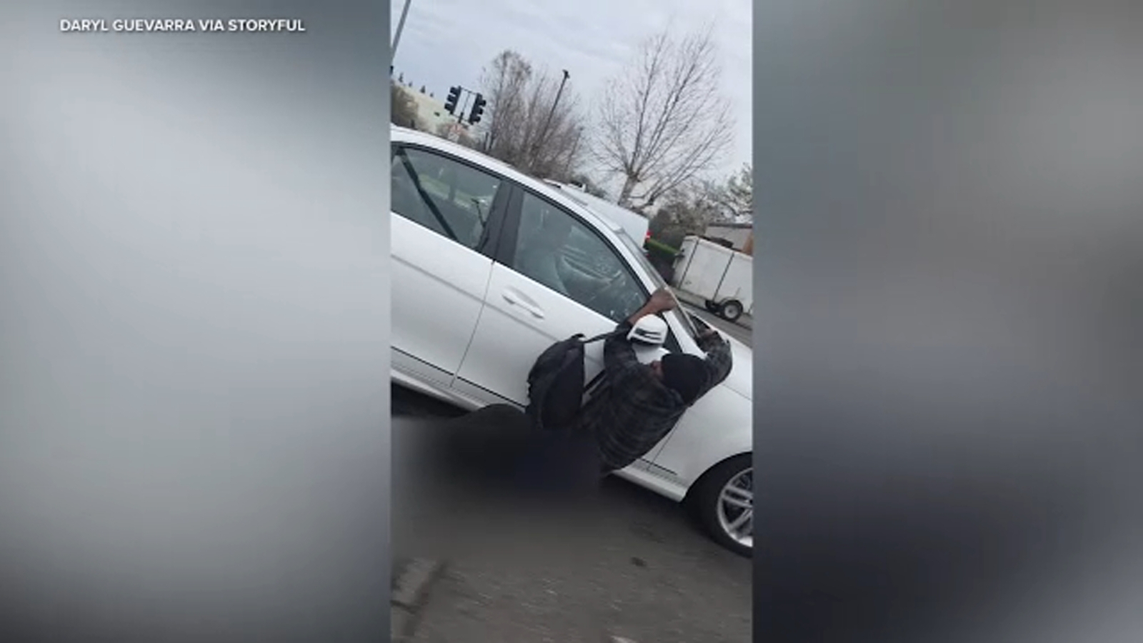 Man spotted hanging onto moving cars in Sacramento