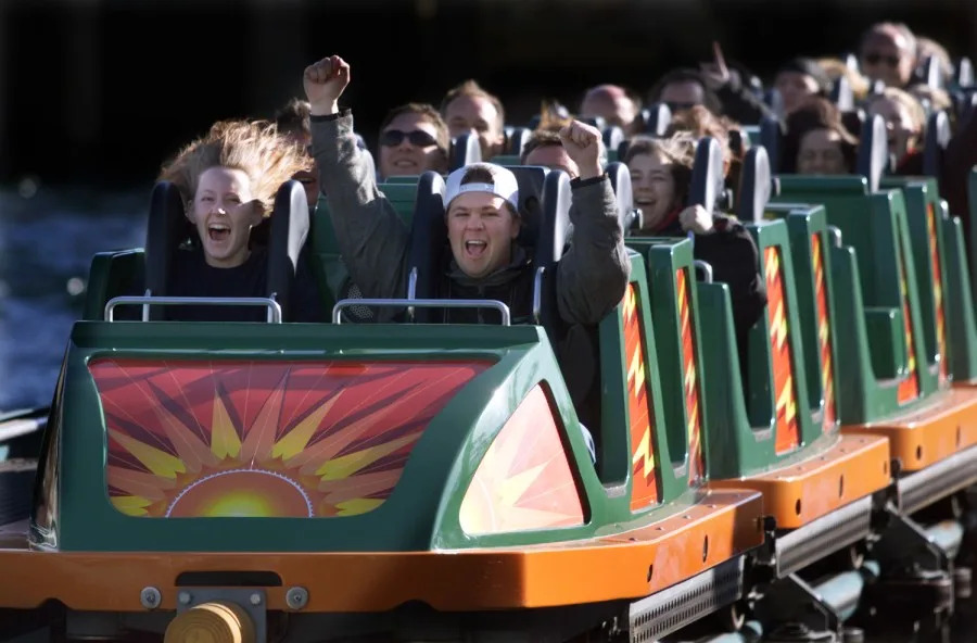 024395.ME.0208.DISNEY1.MB(ANAHEIM)Riders on the California Screamin’ roller coaster raised their hands and cheered.The grand opening of Disney’s California Adventure kickedoff thursday morning with fireworks, dancing, and a lot of fun. (Photo by Mark Boster/Los Angeles Times via Getty Images)