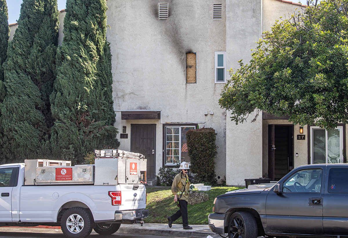 Bystanders save woman dangling from second-floor window to escape fire, LBFD says • Long Beach Post News