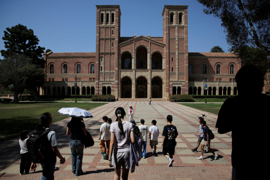 FILE PHOTO: People walk through the campus of the University of California Los Angeles (UCLA) in Los Angeles