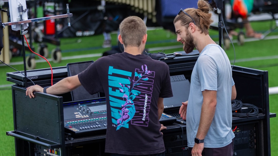 Griffin Law (right) handles the Mandarins’ lead engineering duties and manages the production staff for live performances.