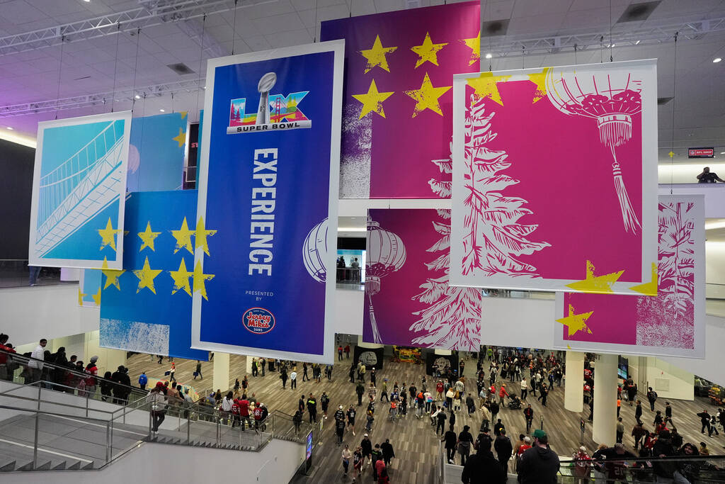 Fans arrive at the Super Bowl Experience in San Francisco, Friday, Feb. 6, 2026. (Steve Luciano ...