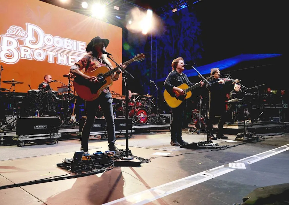 <em>Patrick Simmons, Tom Johnston, and John McFee of The Doobie Brothers perform onstage during the 2025 Backyard Concert supporting Teen Cancer America and the UCLA Health Center. (Photo by Kevin Mazur/Getty Images for BC)</em>