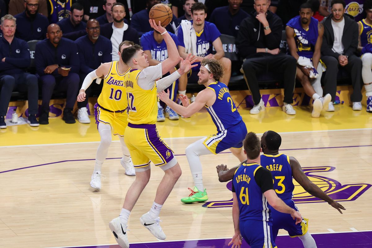 Los Angeles Lakers forward Jake LaRavia (12) shoots the basketball during an NBA game against the Golden State Warriors on February 7, 2025 in Los Angeles, CA.