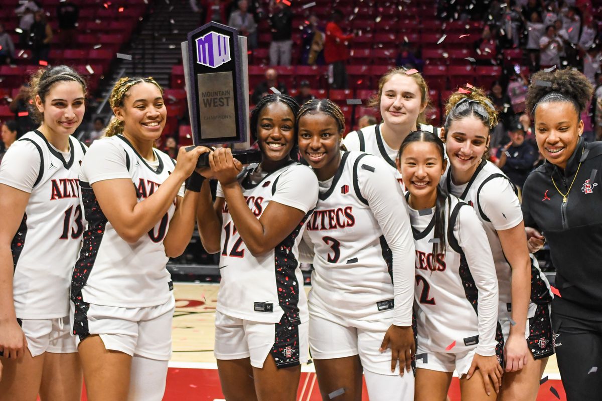 SDSU Aztecs celebrate winning the Mountain West Championships during an NCAA Women’s Basketball game against Fresno State Saturday February 21, 2026 in San Diego, California. SDSU Aztecs celebrate winning the Mountain West Championships during an NCAA Women’s Basketball game against Fresno State Saturday February 21, 2026 in San Diego, California.