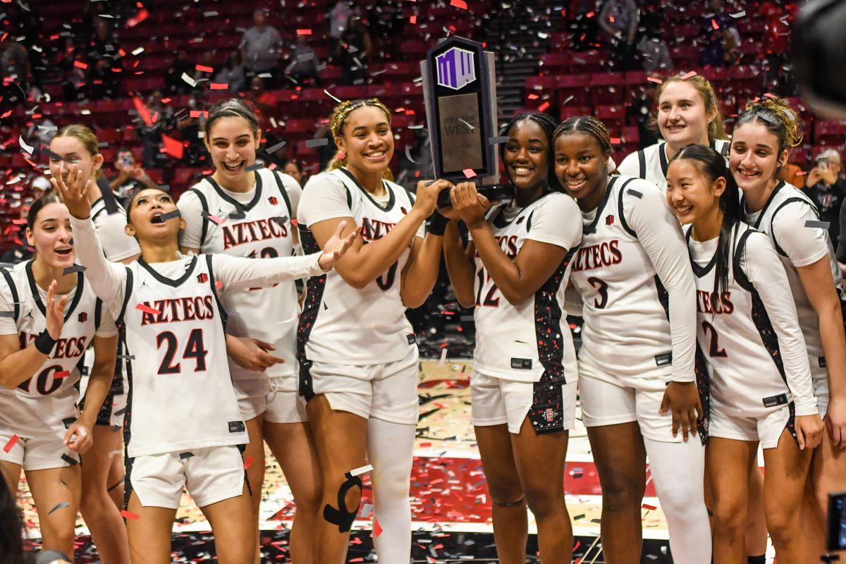 SDSU Aztecs celebrate winning the Mountain West Championships during an NCAA Women’s Basketball game against Fresno State Saturday February 21, 2026 in San Diego, California. SDSU Aztecs celebrate winning the Mountain West Championships during an NCAA Women’s Basketball game against Fresno State Saturday February 21, 2026 in San Diego, California.