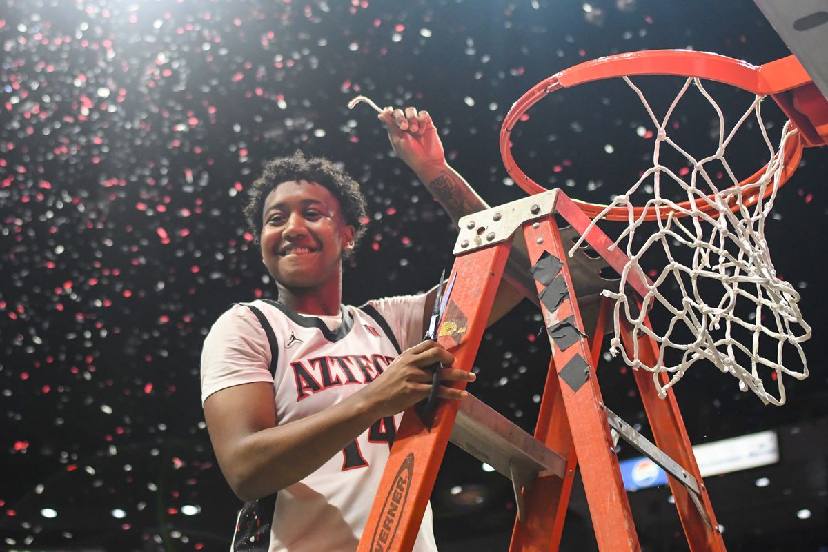 SDSU Aztecs celebrate winning the Mountain West Championships during an NCAA Women’s Basketball game against Fresno State Saturday February 21, 2026 in San Diego, California. SDSU Aztecs celebrate winning the Mountain West Championships during an NCAA Women’s Basketball game against Fresno State Saturday February 21, 2026 in San Diego, California.