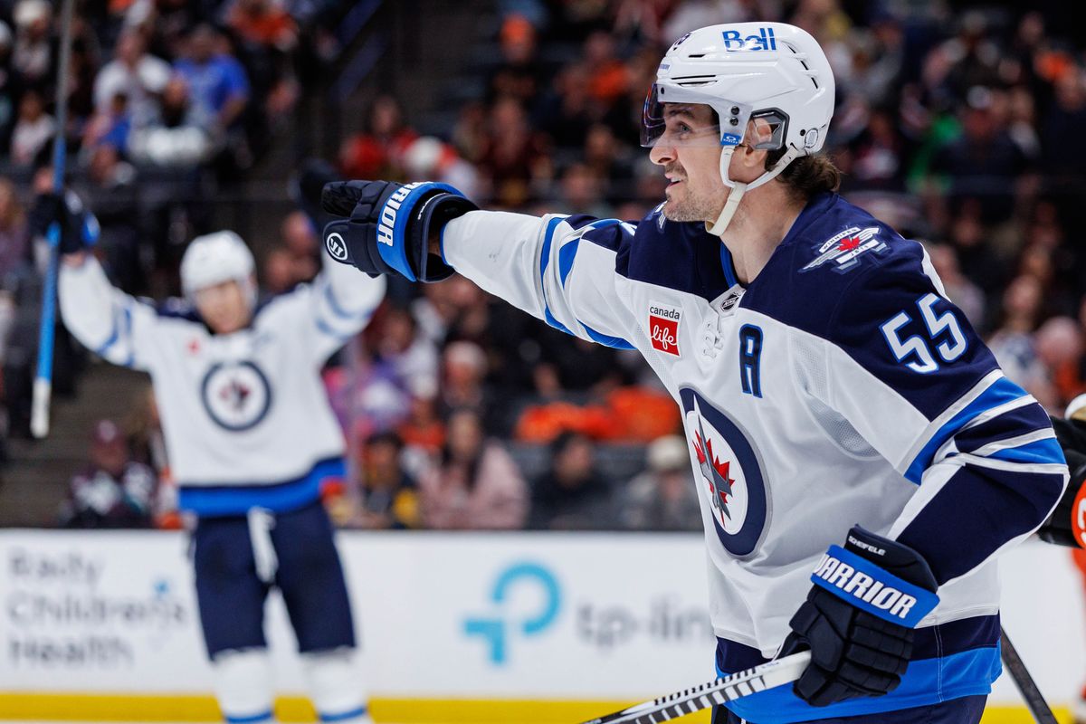 Winnipeg Jets center Mark Scheifele (55) celebrates after a goal during an NHL match against the Anaheim Ducks on February 27, 2026 in Anaheim, California.