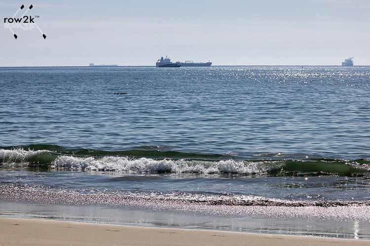 Calm seas at Belmont Shores; you can see the breakwater at the horizon