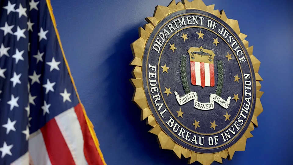 FBI logo next to American flag