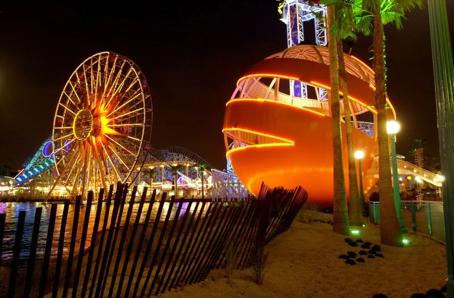 385279 16: The Orange Stinger ride, right, sits next to a beach near the Sun Wheel ride during grand opening days of Disney’s California Adventure theme park February 6, 2001 in Anaheim, CA. The 55-acre park next to Disneyland, is based on California themes and opens to the public on February 8, 2001. (Photo by David McNew/Newsmakers)