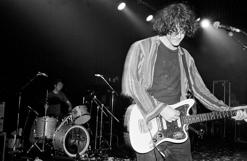 band plays live in a concert hall