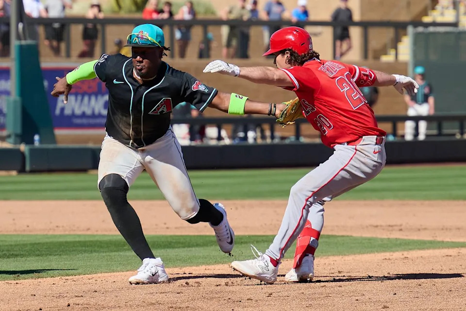 The Los Angeles Angels infielder Adam Frazier (20) gets tagged out against The Arizona Diamondbacks ,February 22nd, 2026 in Scottsdale Arizona.