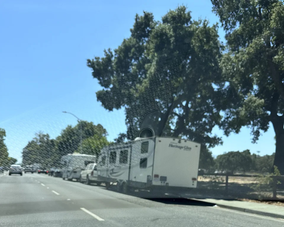 RVs parked next to Stanford University along El Camino Real in Palo Alto, CA.