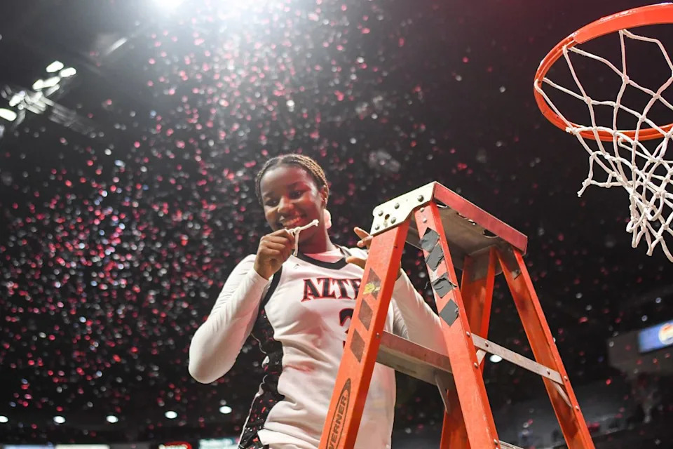 SDSU Aztecs celebrate winning the Mountain West Championships during an NCAA Women’s Basketball game against Fresno State Saturday February 21, 2026 in San Diego, California.