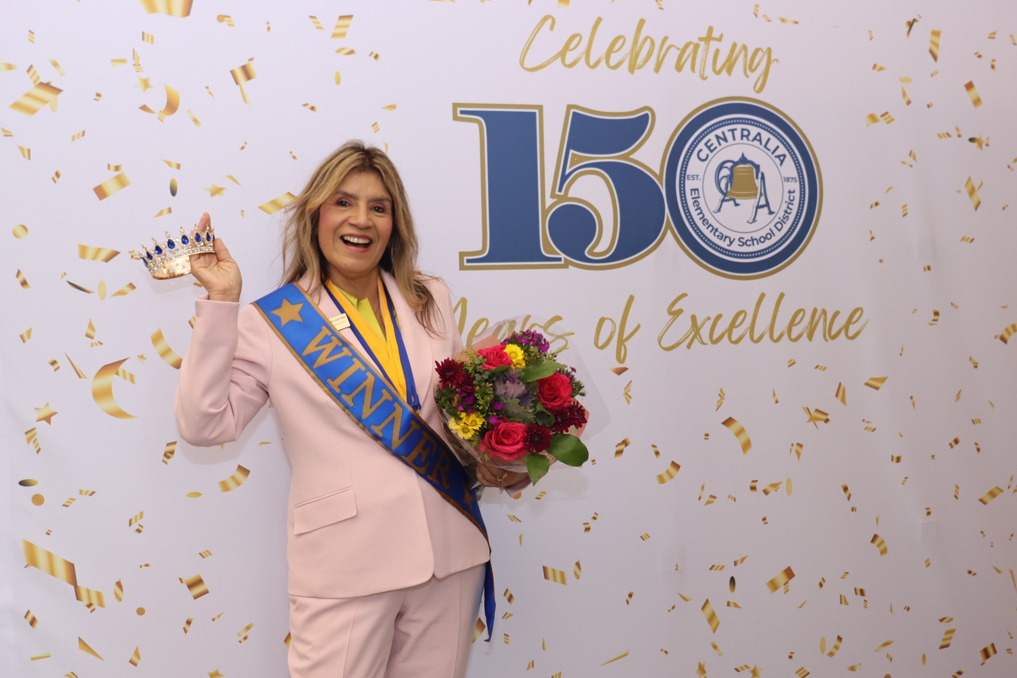 Dr. Norma E. Martinez, superintendent of the Centralia School District, poses with a bouquet after being named the 2026 Superintendent of the Year by ACSA Region 17.
