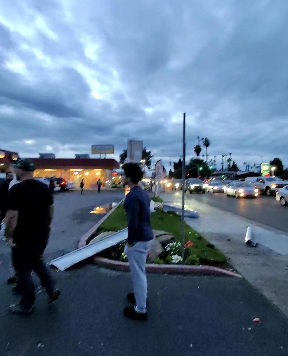 Debris left behind after a vehicle went airborne at Shaw and Maroa avenues in Fresno, California on Wednesday, Feb. 18, 2026.