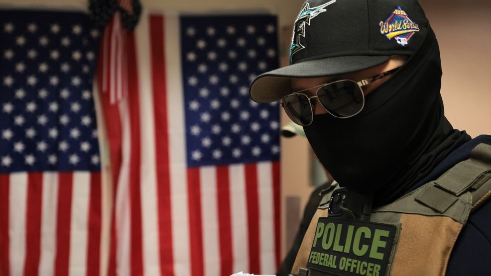 NEW YORK, NEW YORK - JULY 21: Federal agents patrol the halls of immigration court at the Jacob K. Javits Federal Building on July 21, 2025 in New York City. Lawmakers in New York are introducing a bill that would ban law enforcement officers, including federal U.S. Immigration and Customs Enforcement (ICE) agents, from wearing masks. The bill, sponsored by Assemblymember Tony Simone, would be called the Mandating End of Lawless Tactics (MELT) Act. (Photo by Michael M. Santiago/Getty Images)