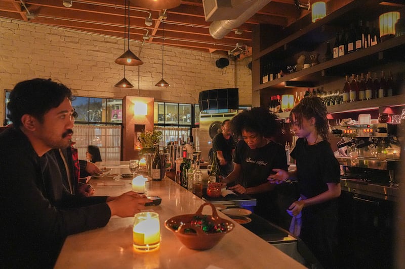 Bartenders and customers.