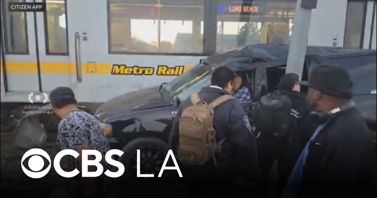 9 people hurt after Metro train collides with vehicle in South Los Angeles