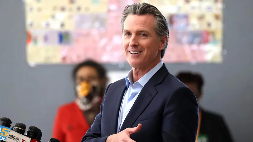 Newsom speaking at a school