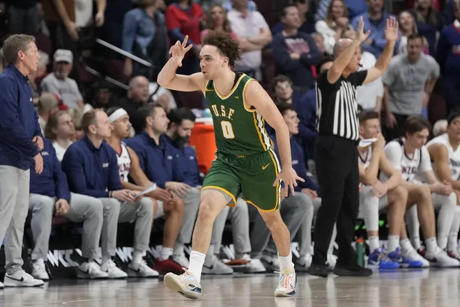 March 10, 2025; Las Vegas, NV, USA; San Francisco Dons guard Ryan Beasley (0) celebrates against the Gonzaga Bulldogs during the first half in the semifinal of the West Coast Conference tournament at Orleans Arena.