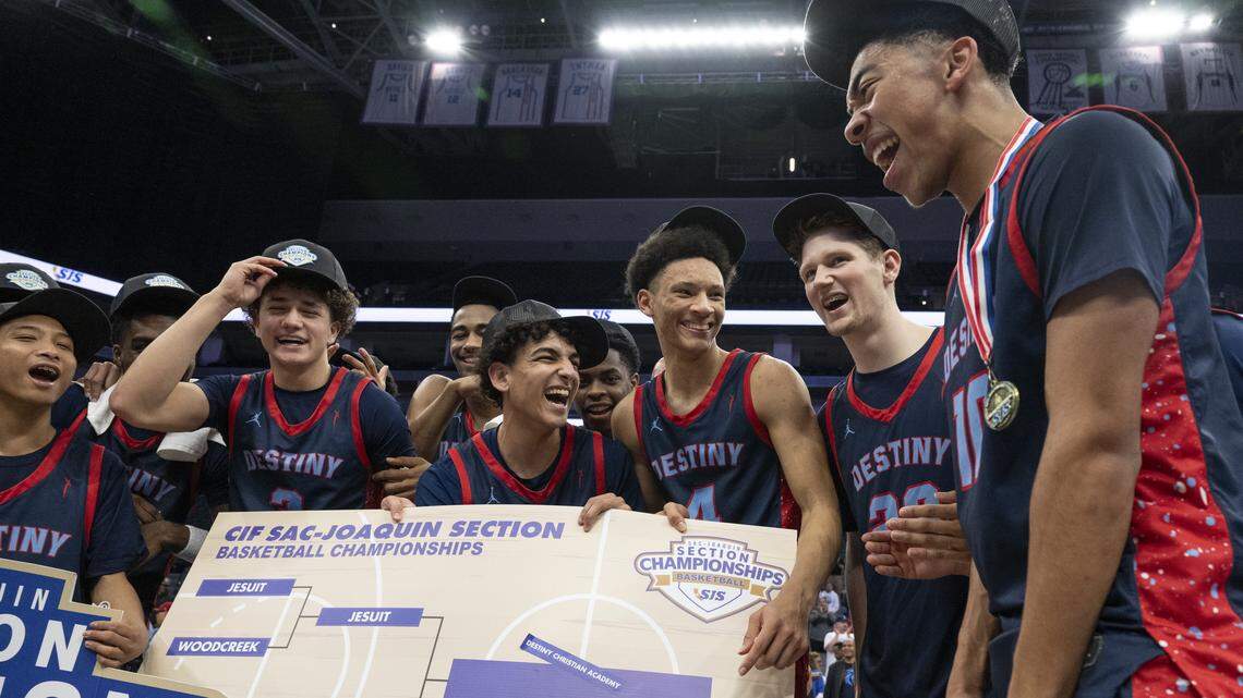 Destiny Christian Academy reacts after winning the CIF Sac-Joaquin Section Division II boys basketball championship at Golden 1 Center in Sacramento on Friday.