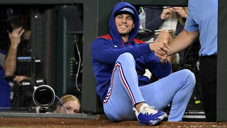 Texas Rangers center fielder Sam Haggerty smiles after getting hit by a foul ball.
