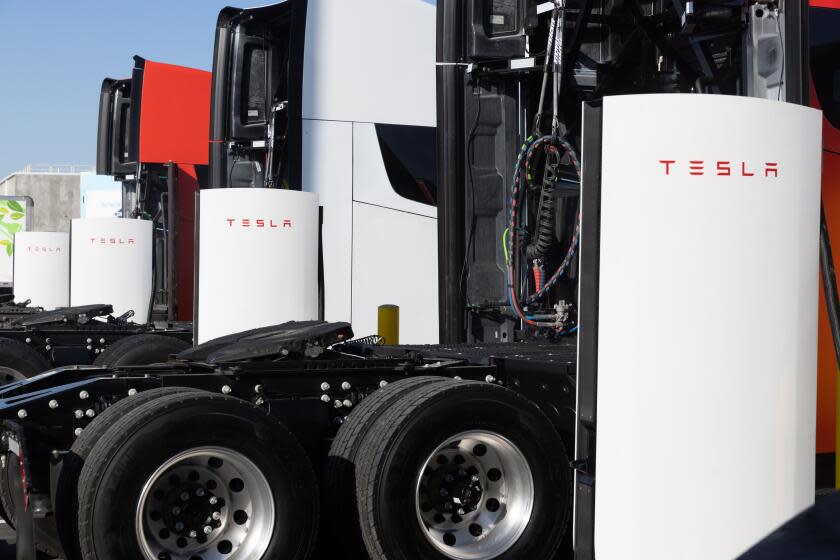 Tesla Semi electric trucks at Supercharger stations at the Frito-Lay manufacturing facility in Modesto, California, US, on Wednesday, Jan. 18, 2023. PepsiCos Frito-Lay is replacing its diesel-powered freight equipment with zero-emission trucks, solar panels and energy-storage systems at it's Modesto plant. Photographer: Benjamin Fanjoy/Bloomberg via Getty Images