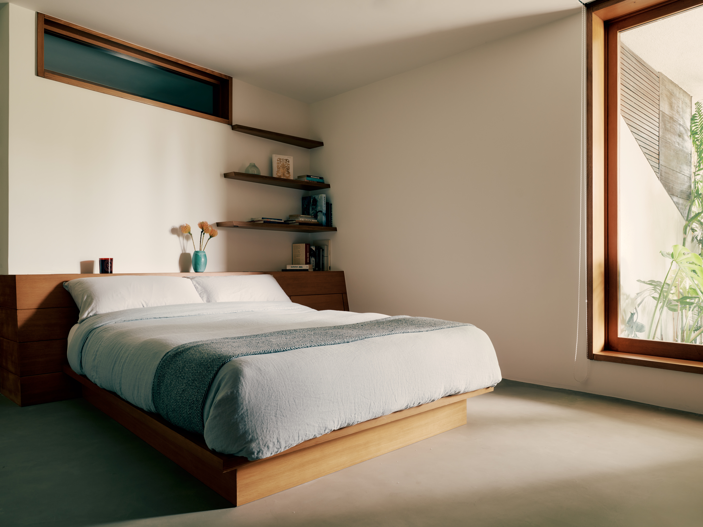 Conner &amp; Perry design for Lautner's Castle, showing the interior of a bedroom with a big picture window seen on the edge