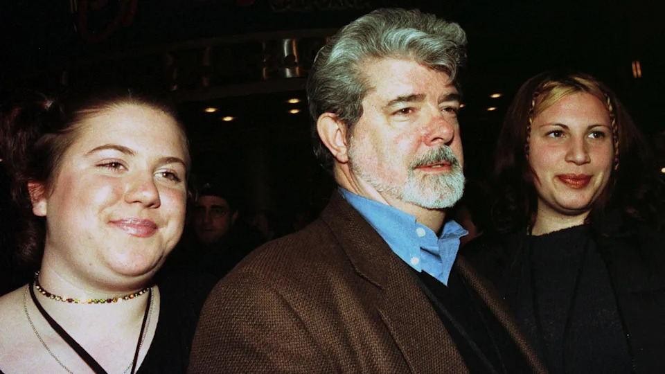 Director George Lucas arrives with his daughters to VIP party Getty