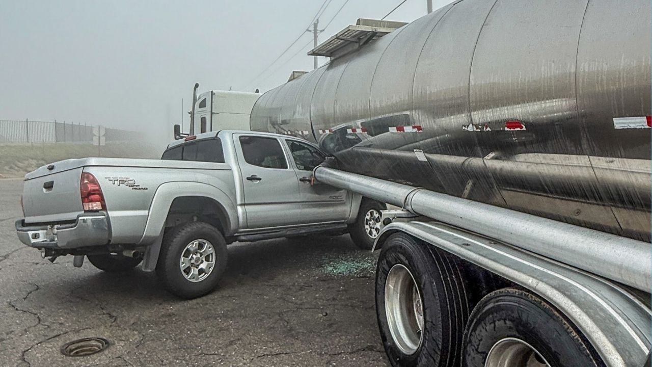 A tanker pulled into a Fresno intersection in dense fog, but a pickup slowed in time, leaving everyone unharmed. (CHP)