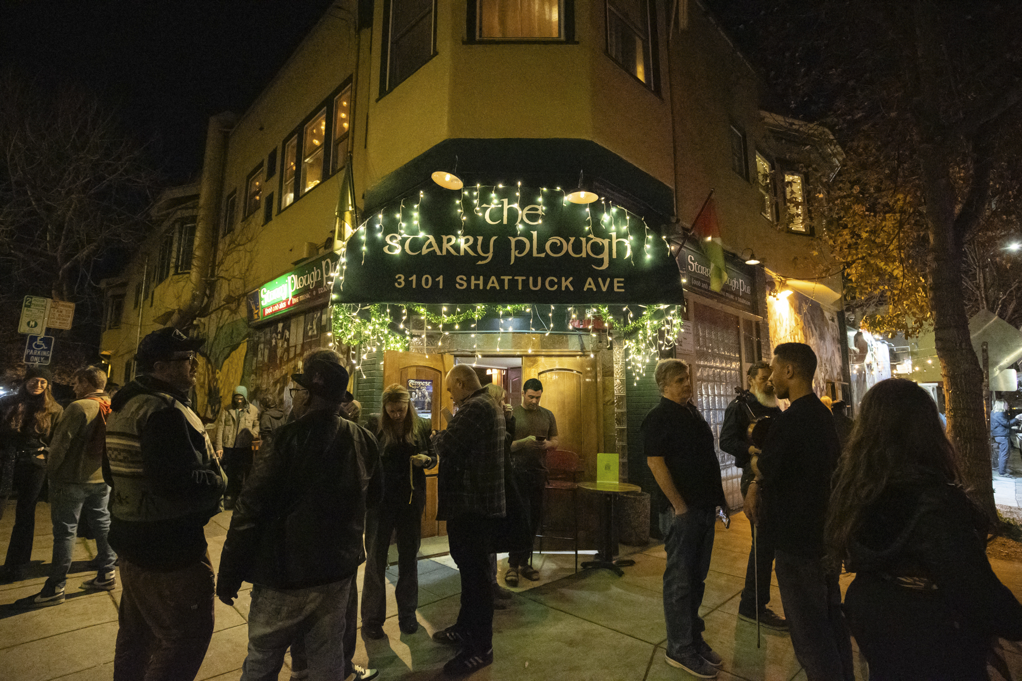 A crowd forms outside the jam session in honor of Anthony ‘Anthony Ant’ Anderson at The Starry Plough Pub in Berkeley, California on Thursday, Feb. 12, 2026. 