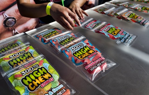 In this Saturday, Oct. 20, 2018 photo medicated High Chew edibles are shown on display and offered for sale at the cannabis-themed Kushstock Festival at Adelanto, Calif. (AP Photo/Richard Vogel)