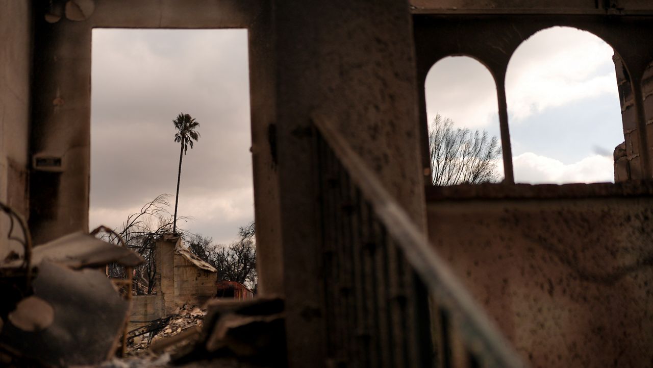 The Eaton Fire leaves devastation behind Friday, Jan. 17, 2025 in Altadena, Calif. (AP Photo/Jae C. Hong)