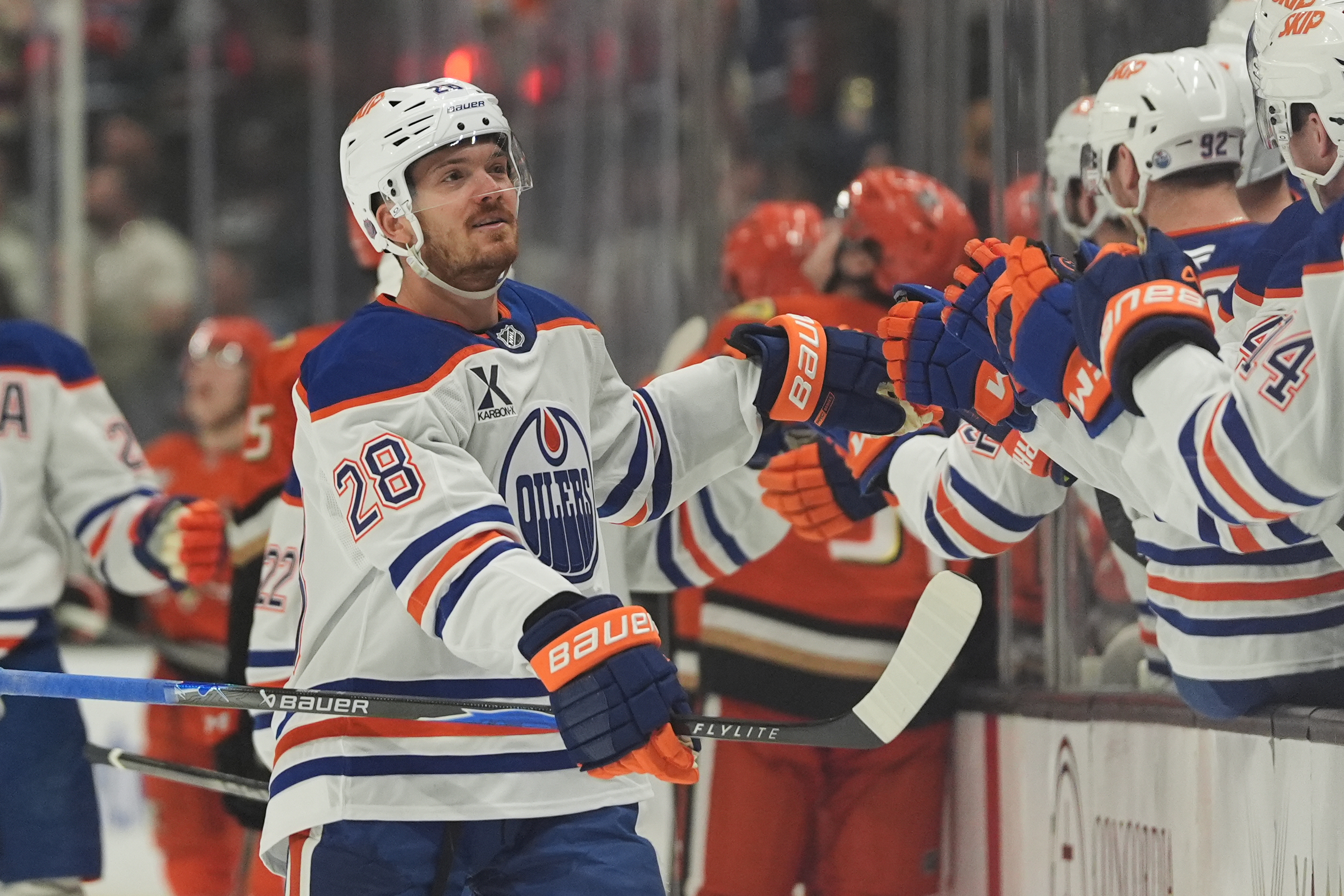Edmonton Oilers center Jack Roslovic (28) celebrates his goal with...