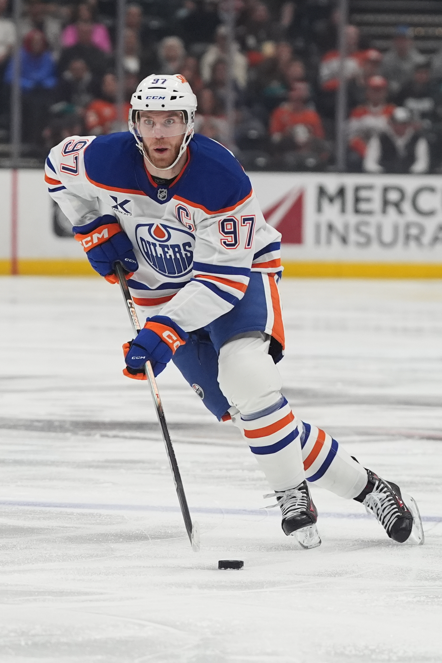Edmonton Oilers center Connor McDavid skates with the puck during...
