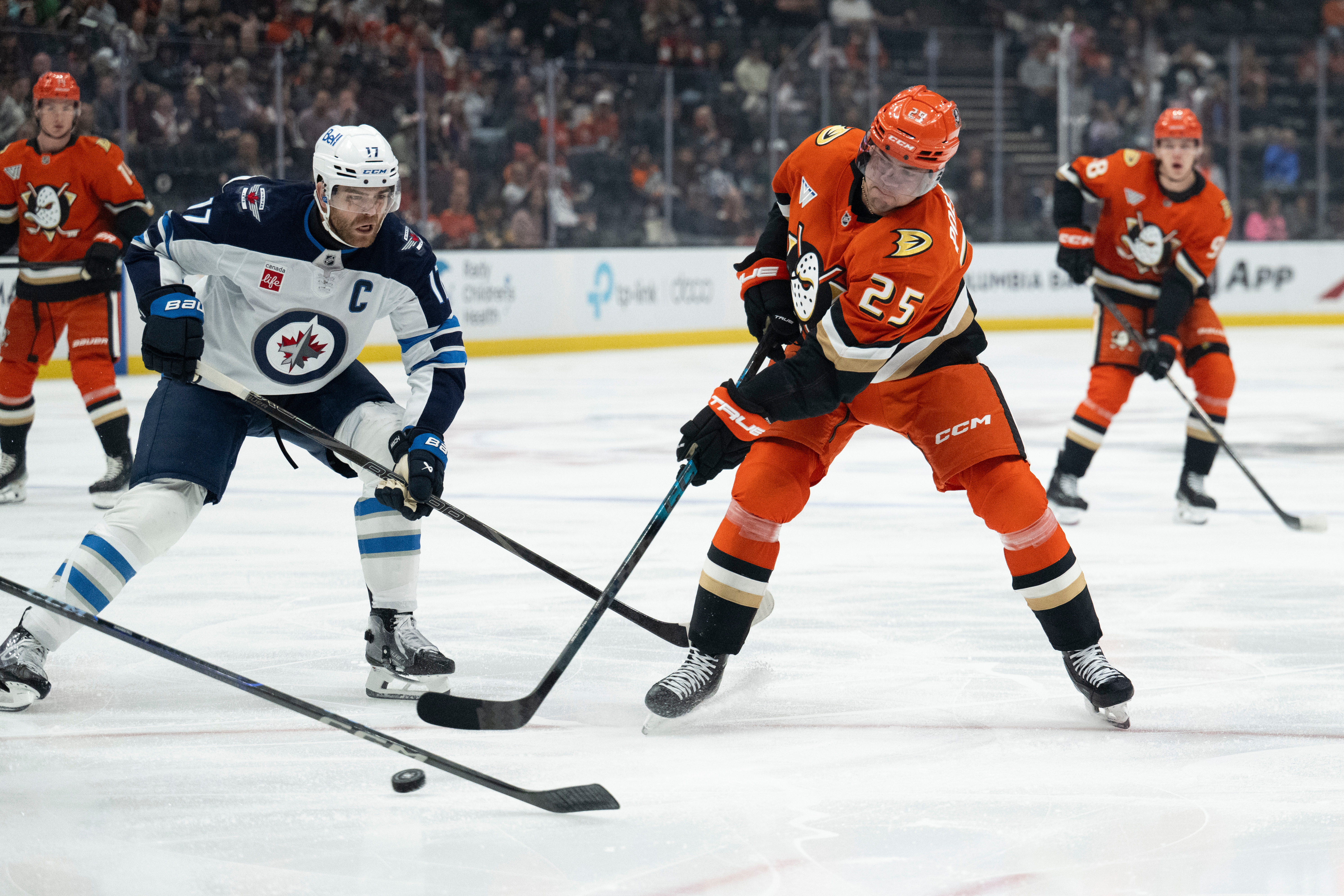 Ducks center Ryan Poehling (25) shoots as Winnipeg Jets center...