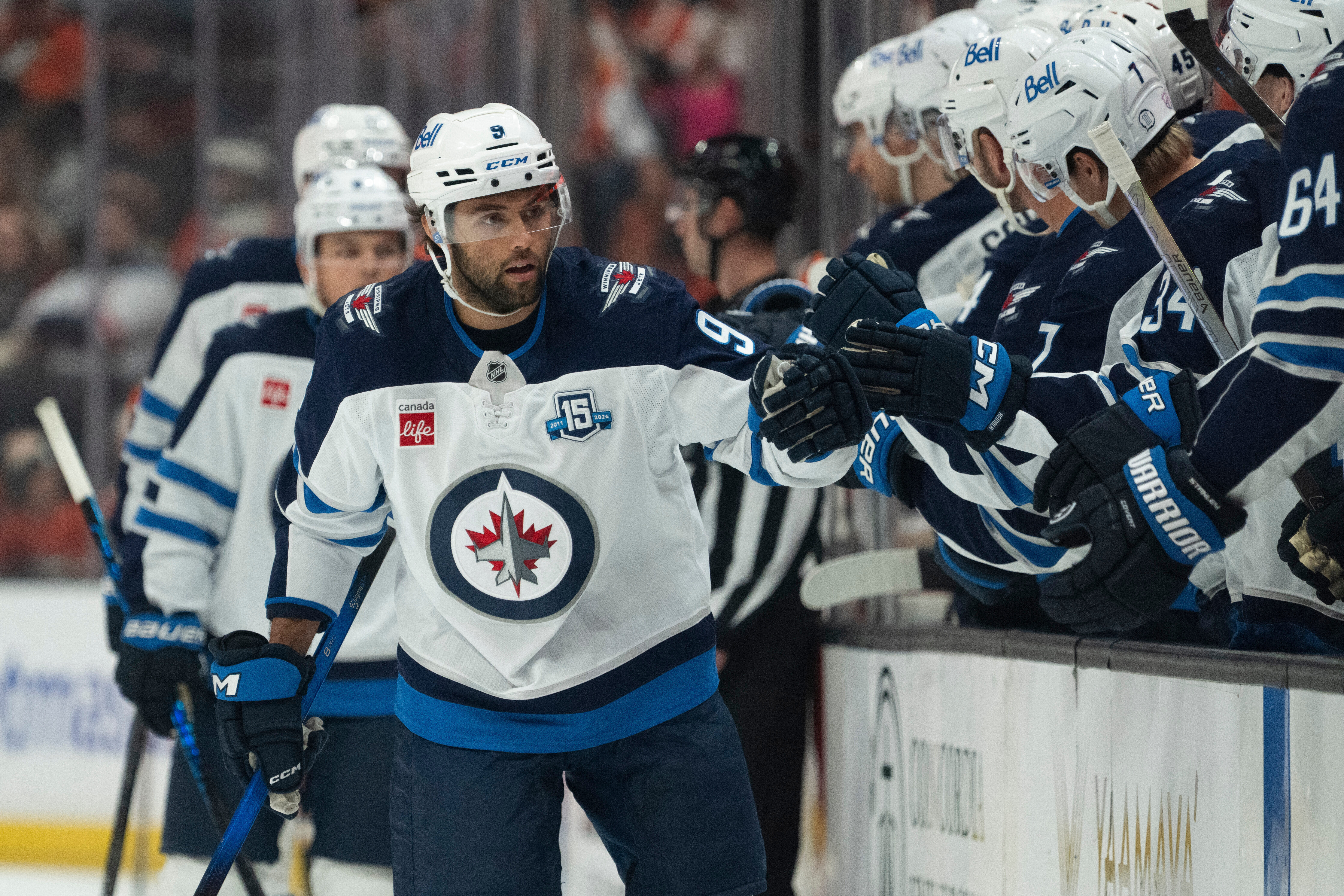 Winnipeg Jets left wing Alex Iafallo (9) celebrates after his...