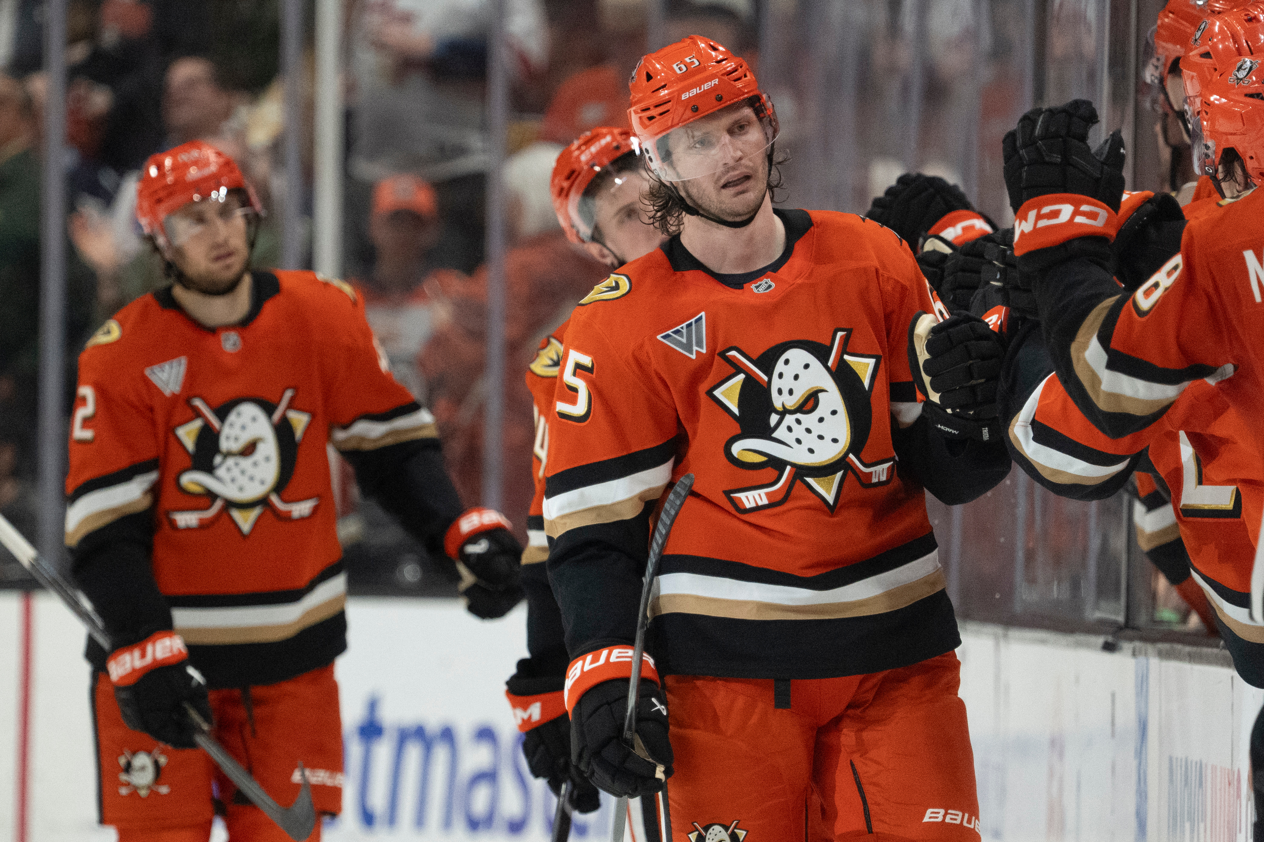 Ducks defenseman Jacob Trouba celebrates his goal with the bench...