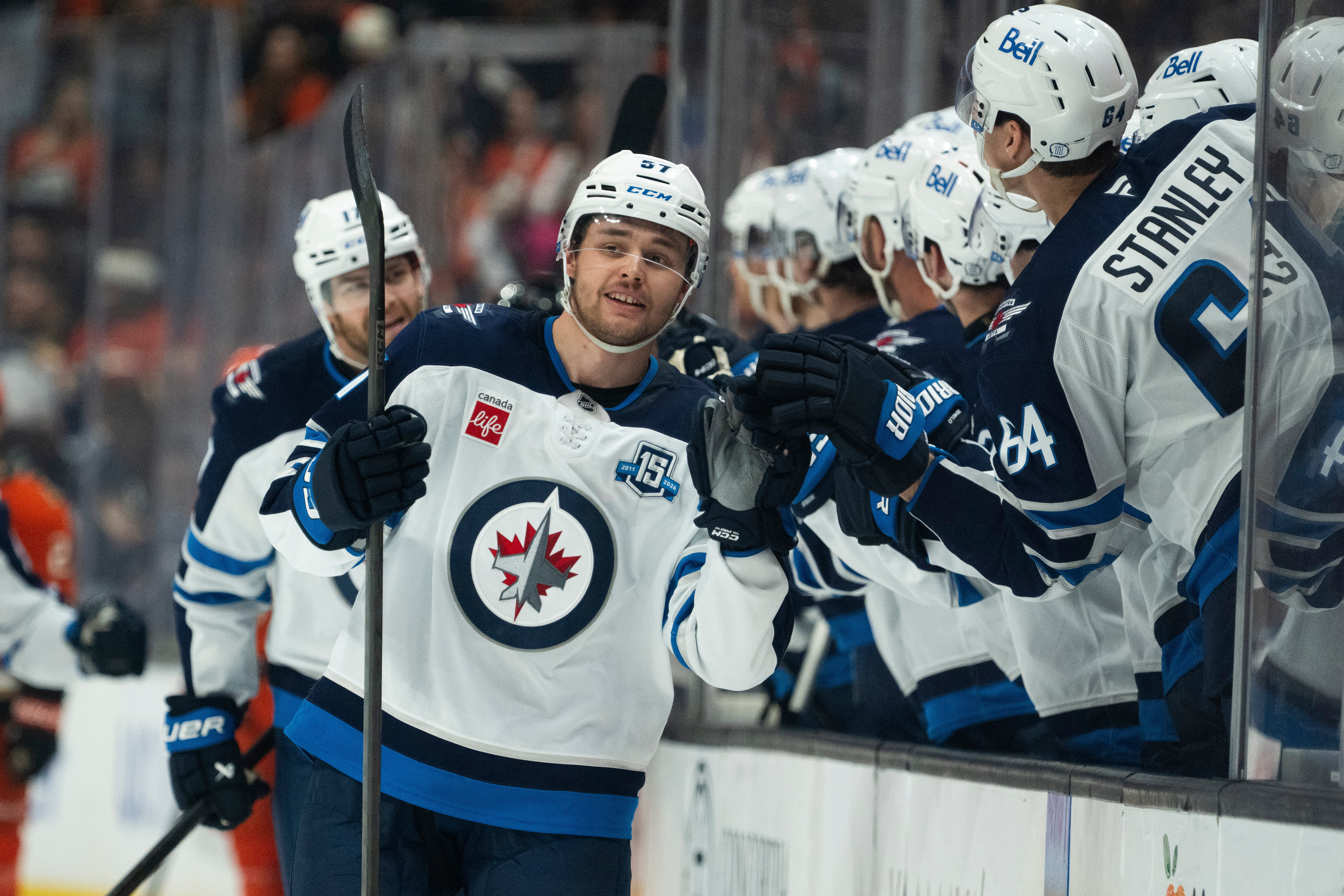 Winnipeg Jets defenseman Elias Salomonsson celebrates his goal with the...